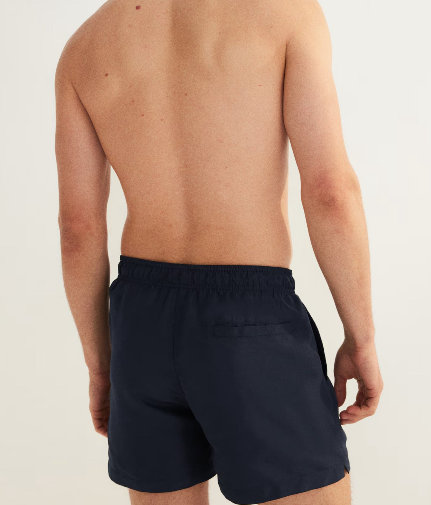 Back view of men's beach shorts online in navy blue, perfect for summer activities and relaxation