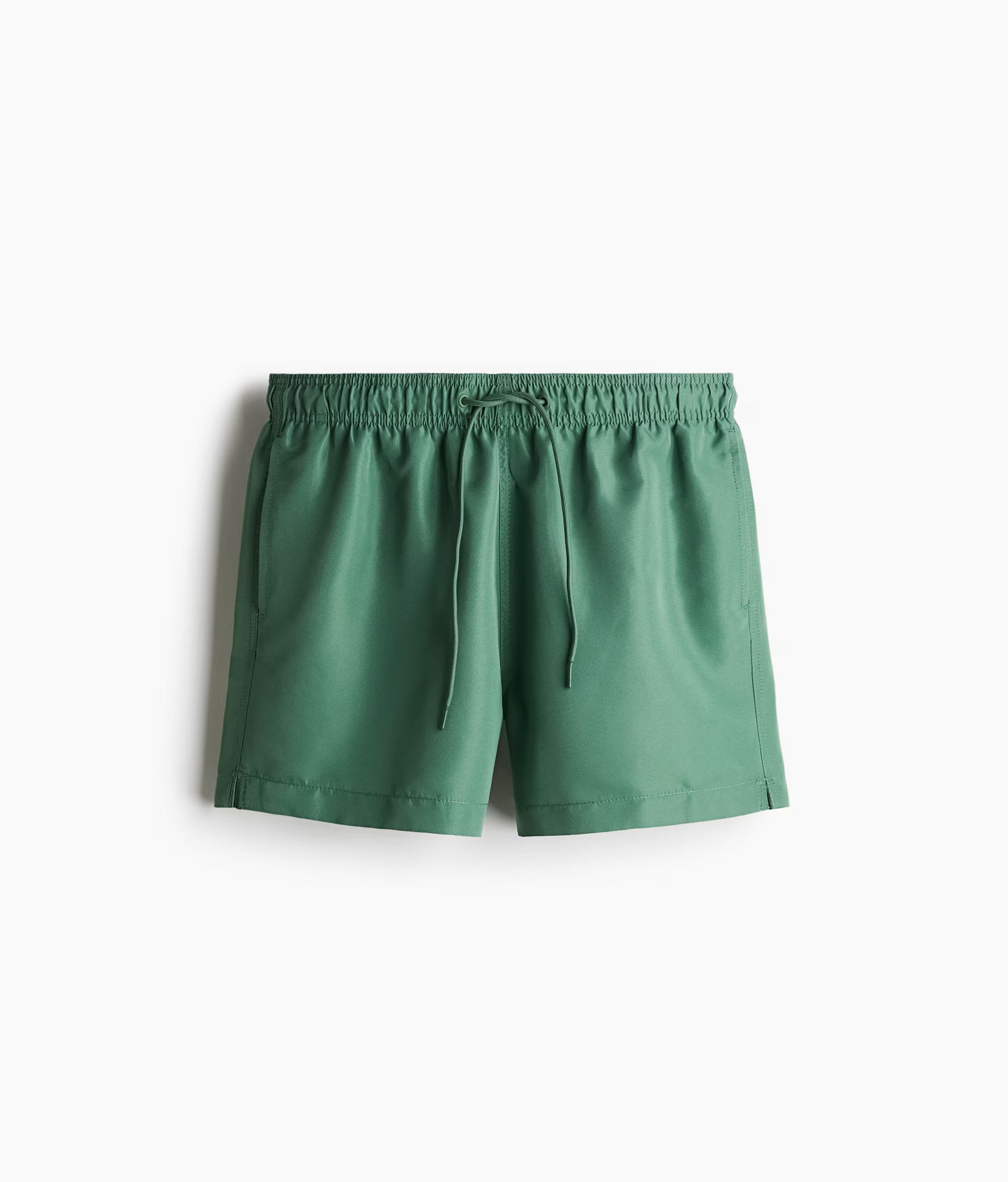 Men's swimwear India in green color, featuring an elastic waistband and drawstring closure