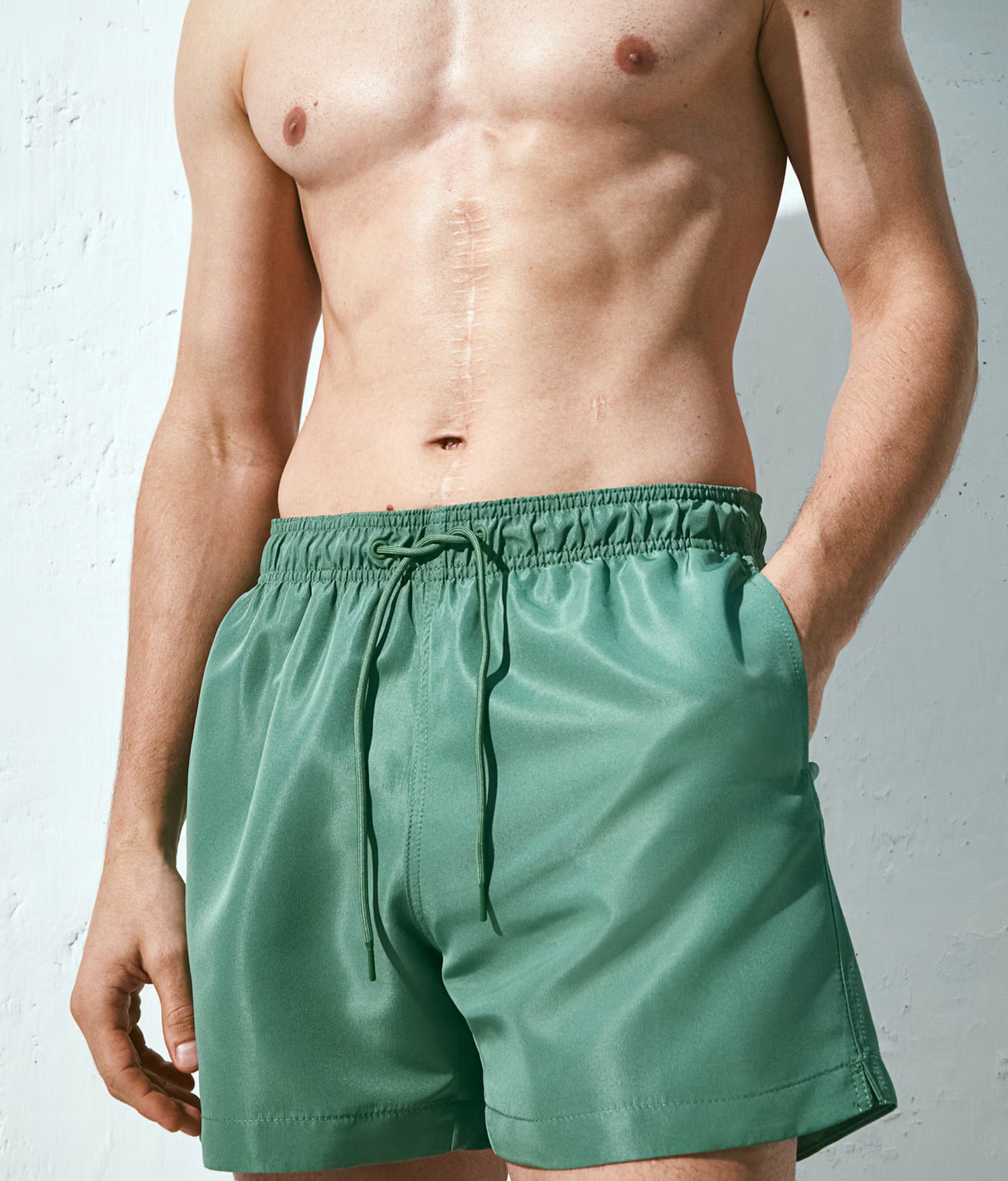 Men's swimwear India in a stylish green color, ideal for summer beach outings