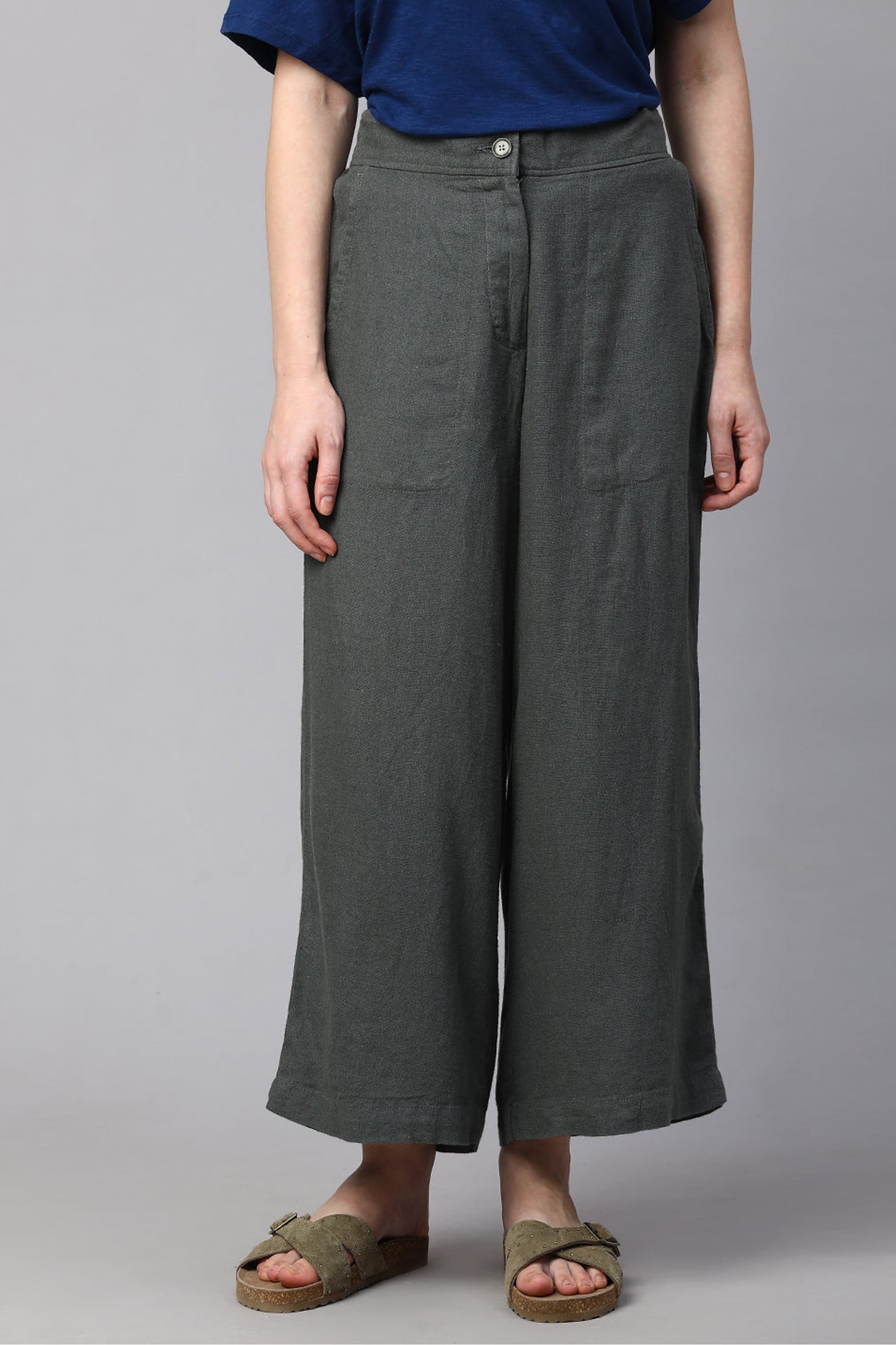 Comfortable dark green women's linen culottes with a relaxed fit and button closure