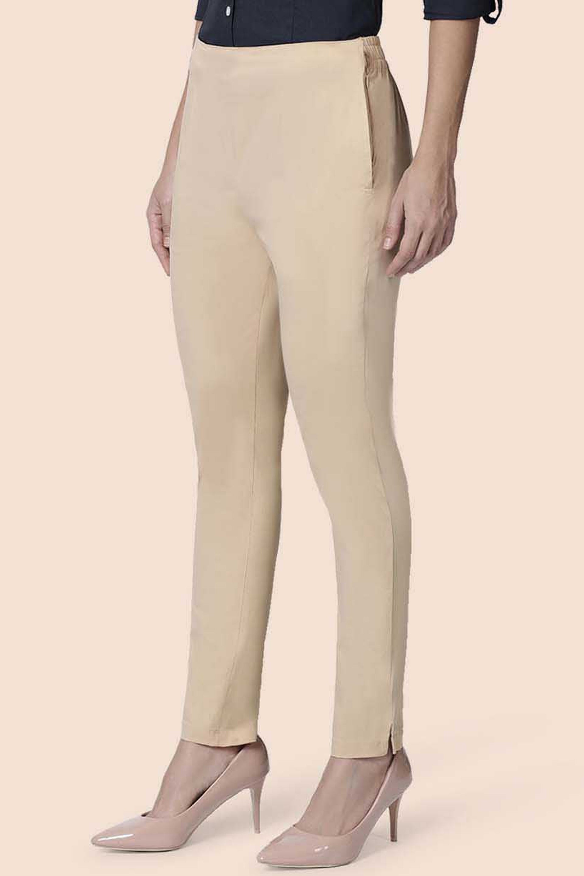 Beige straight pants for women with a tailored fit and side slits for a stylish look