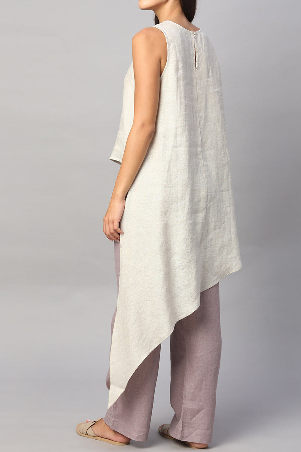 Beige summer top for women with asymmetrical hem and lightweight fabric, perfect for warm weather styling