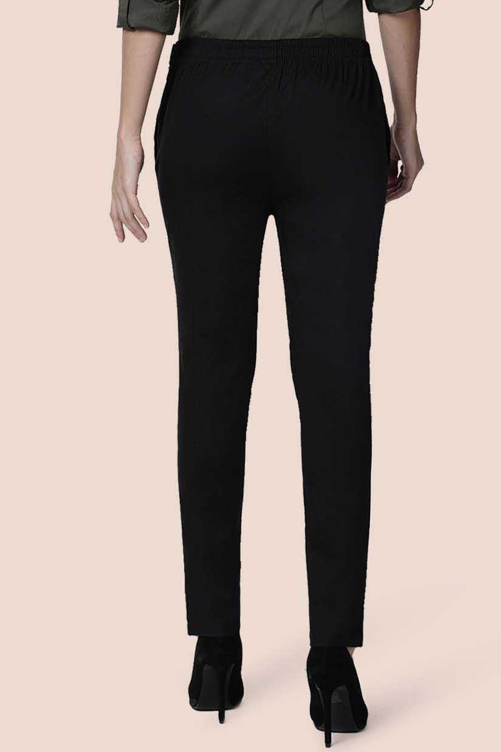 Black straight pants for women featuring a comfortable elastic waistband and a sleek design