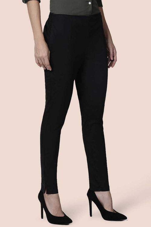 Black straight pants for women with a sleek design and stylish side slits