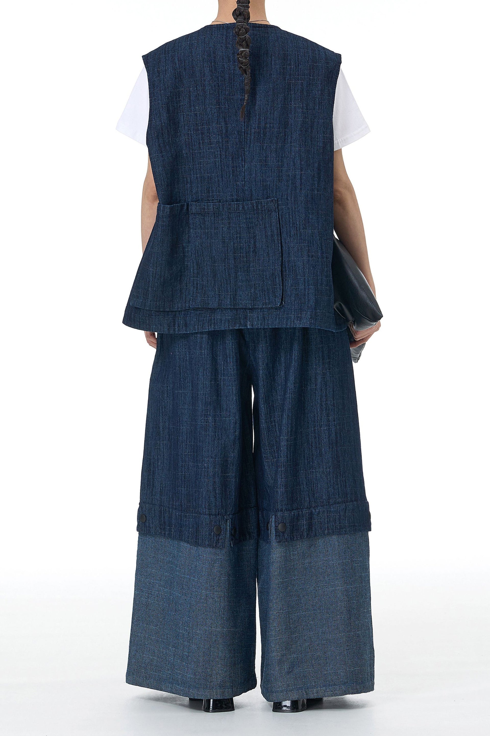 Back view of a co-ord denim outfit featuring a sleeveless top and wide-leg pants available online