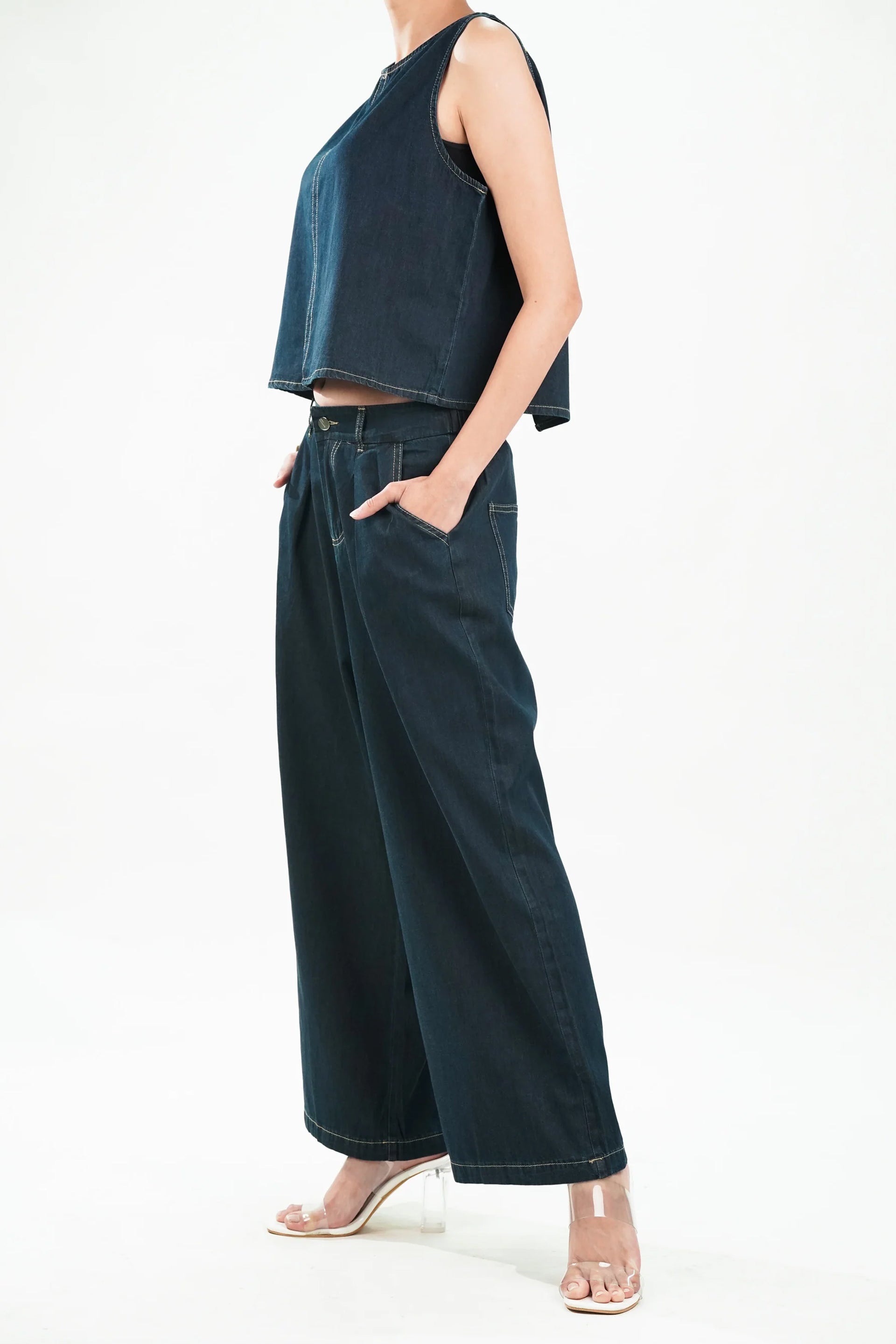 Model wearing a stylish cotton denim co-ord set featuring a cropped top and wide-leg pants
