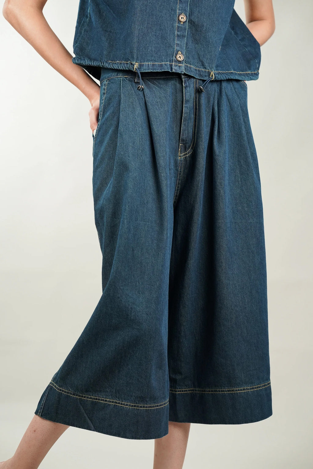 Cotton denim coord set featuring a stylish loose top and wide-leg cropped pants in rich blue