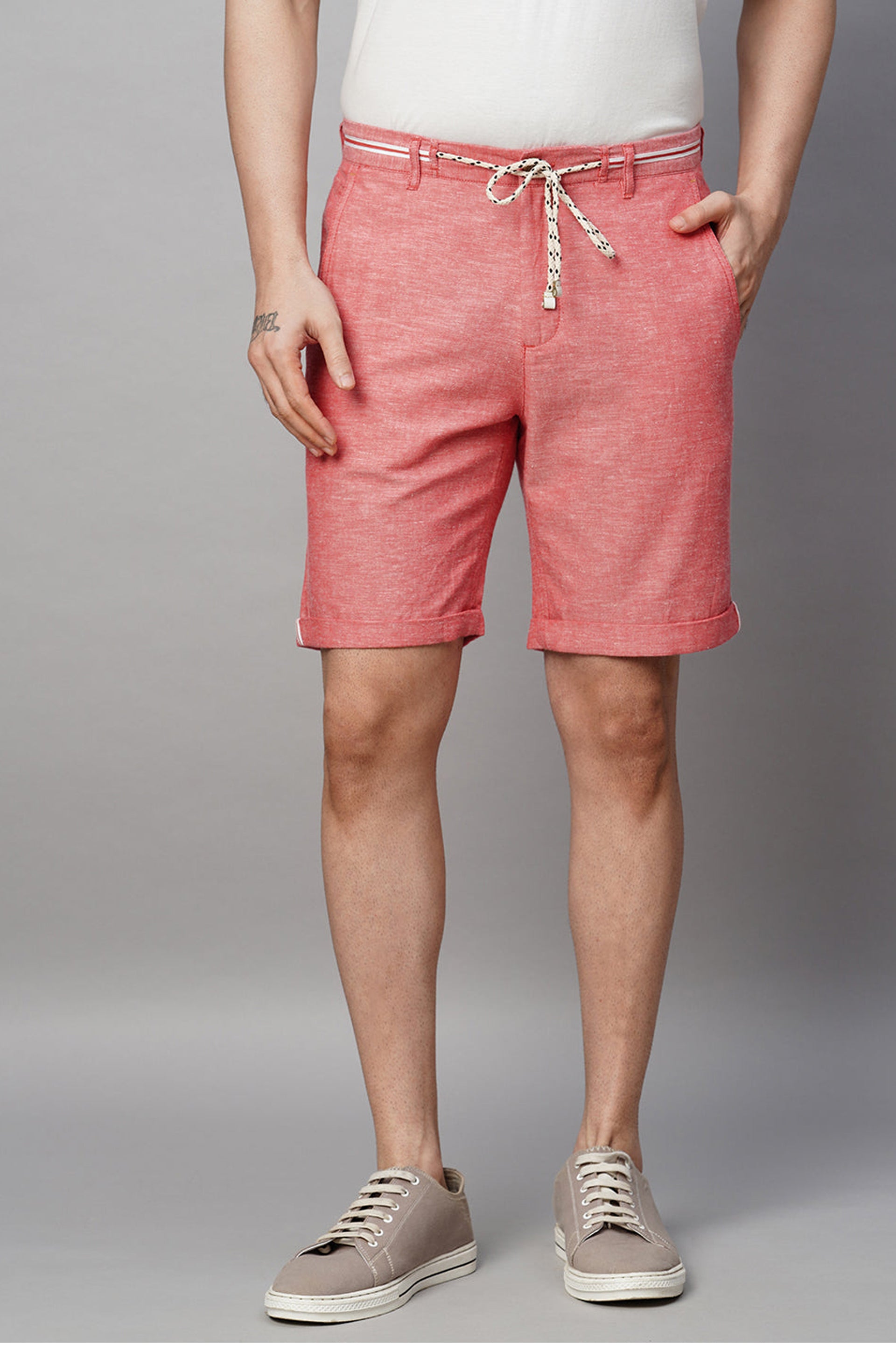 Stylish red cotton linen shorts for men with a drawstring waistband and side pockets