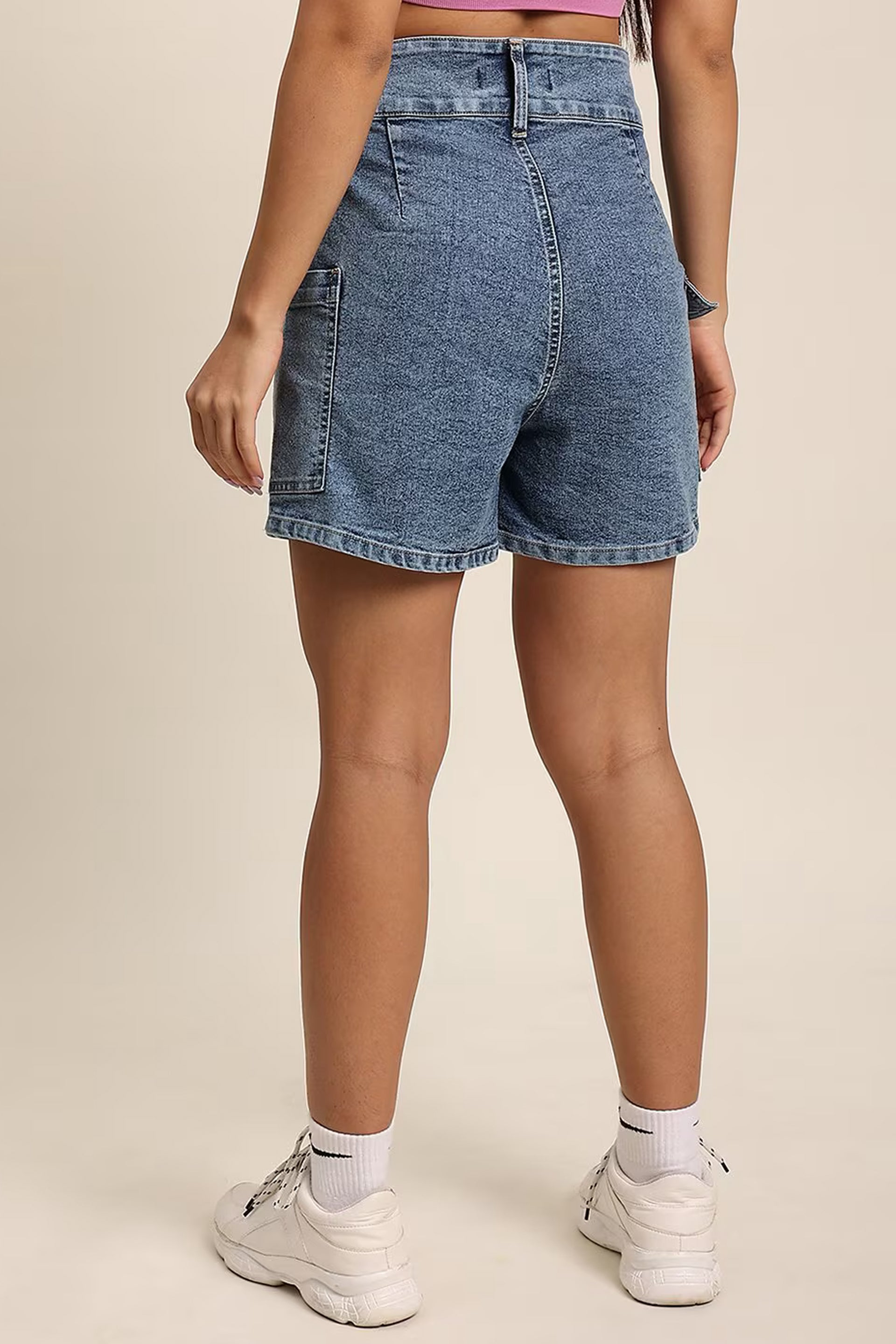 Back view of denim skorts for women featuring a comfortable fit and casual style