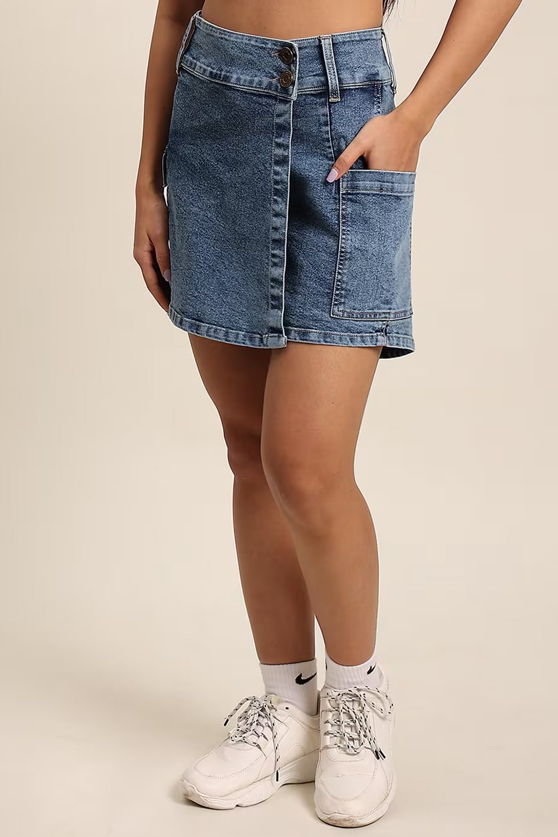 Casual denim skorts for women with a button closure and side pocket for a stylish look