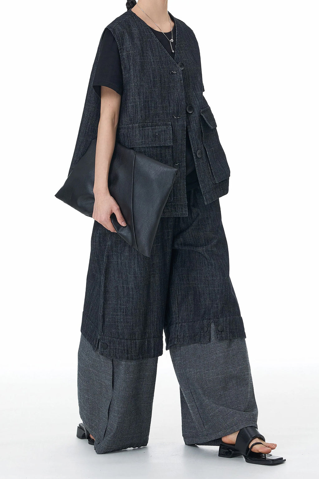Stylish denim waistcoat co-ord set featuring a sleeveless vest and wide-leg pants for a trendy outfit