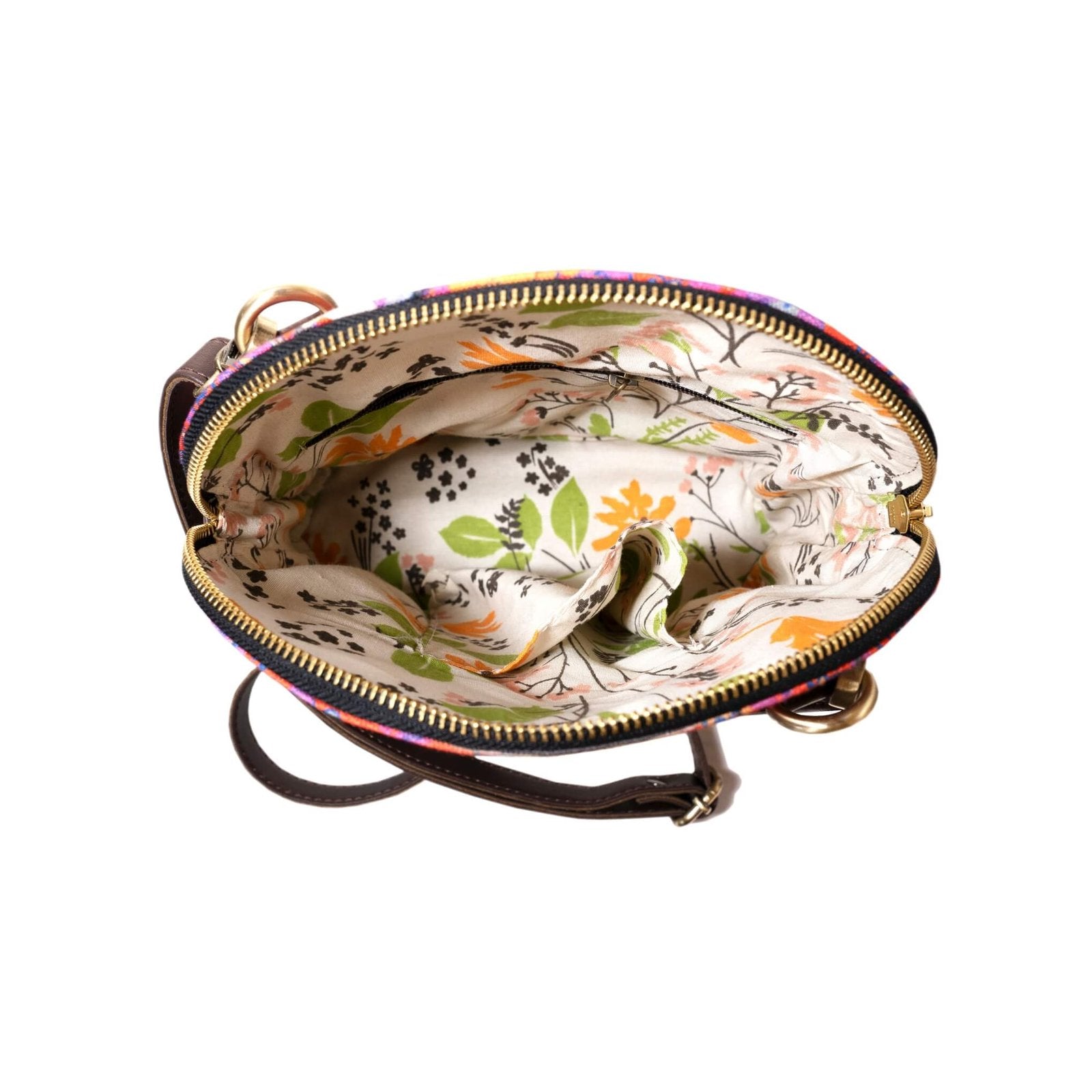 Inside view of a Fatfatiya designer crossbody bag India showing floral lining and spacious compartments