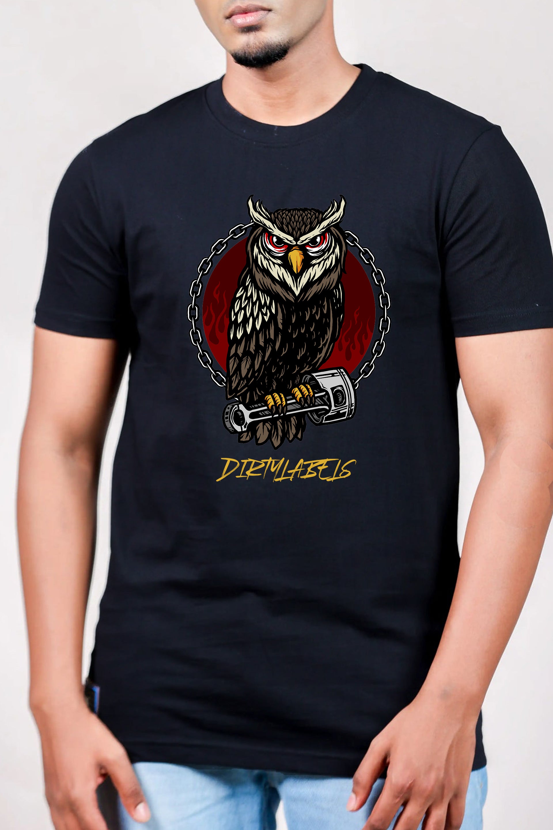 Dirty Owl t-shirt featuring a fierce owl graphic with chains and a wrench design