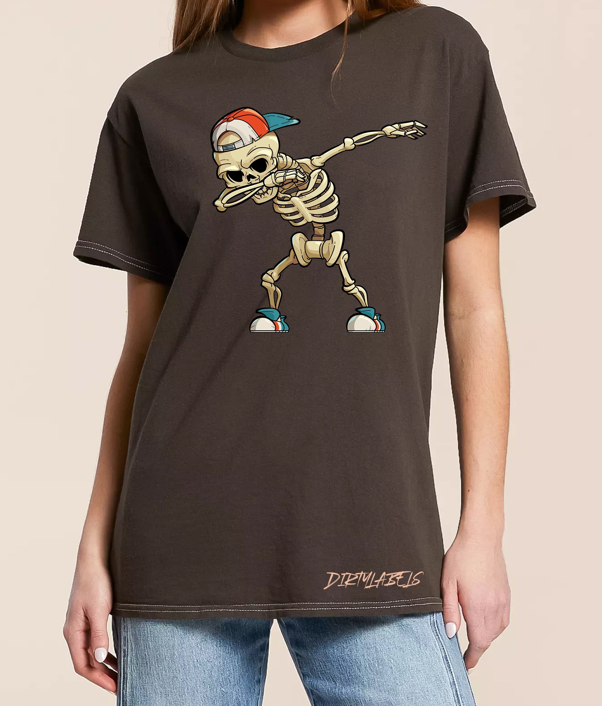 Dark graphic tee featuring a skeleton character, perfect for men women casual outfits