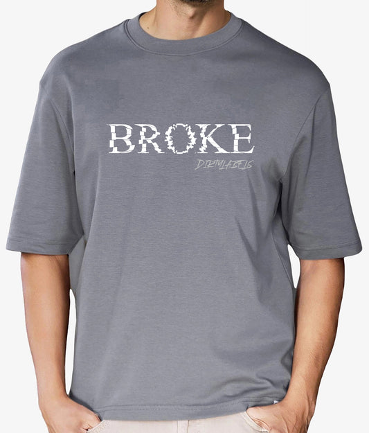 Cool statement t-shirts featuring a bold 'BROKE' design by Dirtylabels in gray