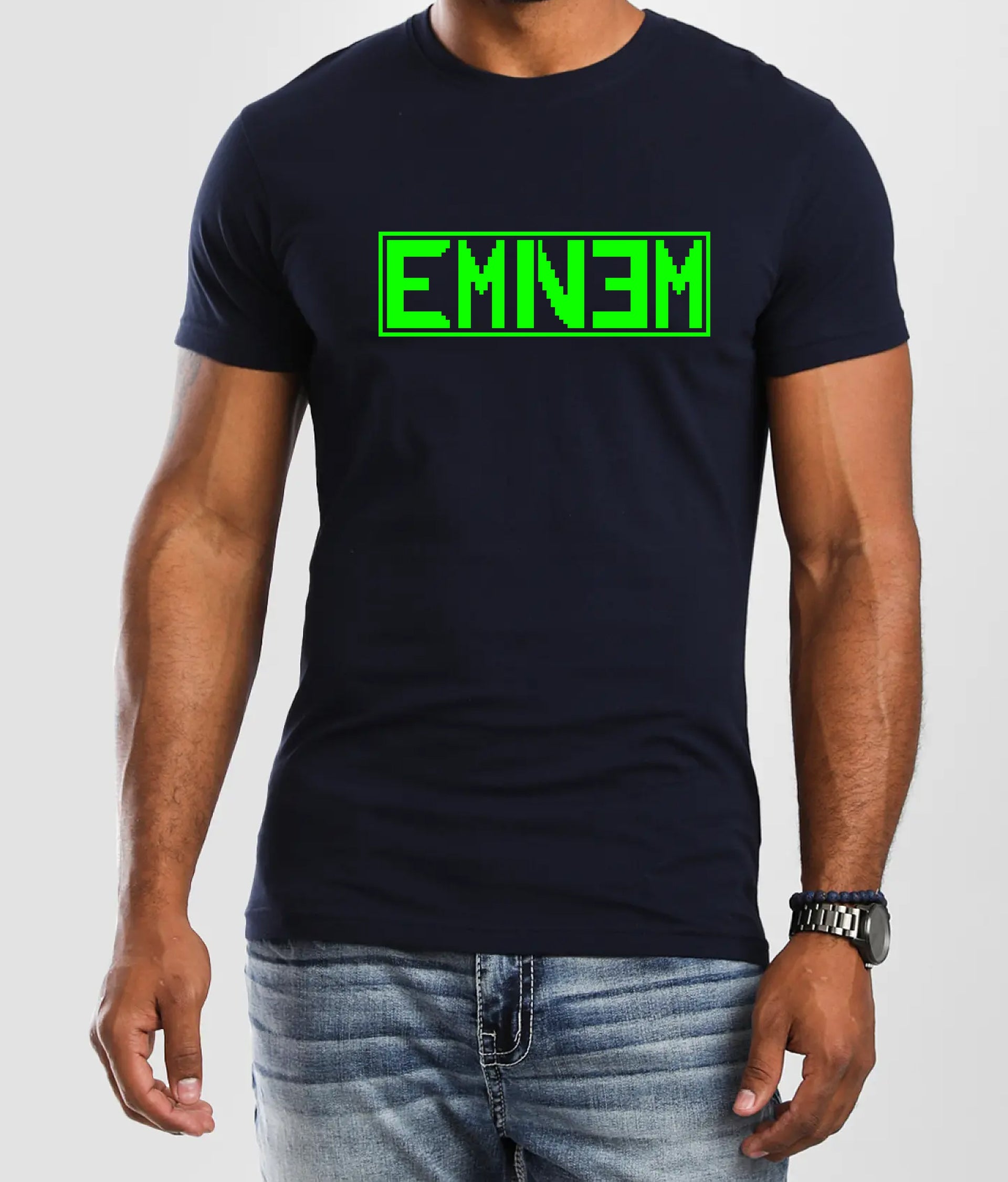 Exclusive Eminem merchandise India featuring a neon green EM1N3 graphic t-shirt for fans