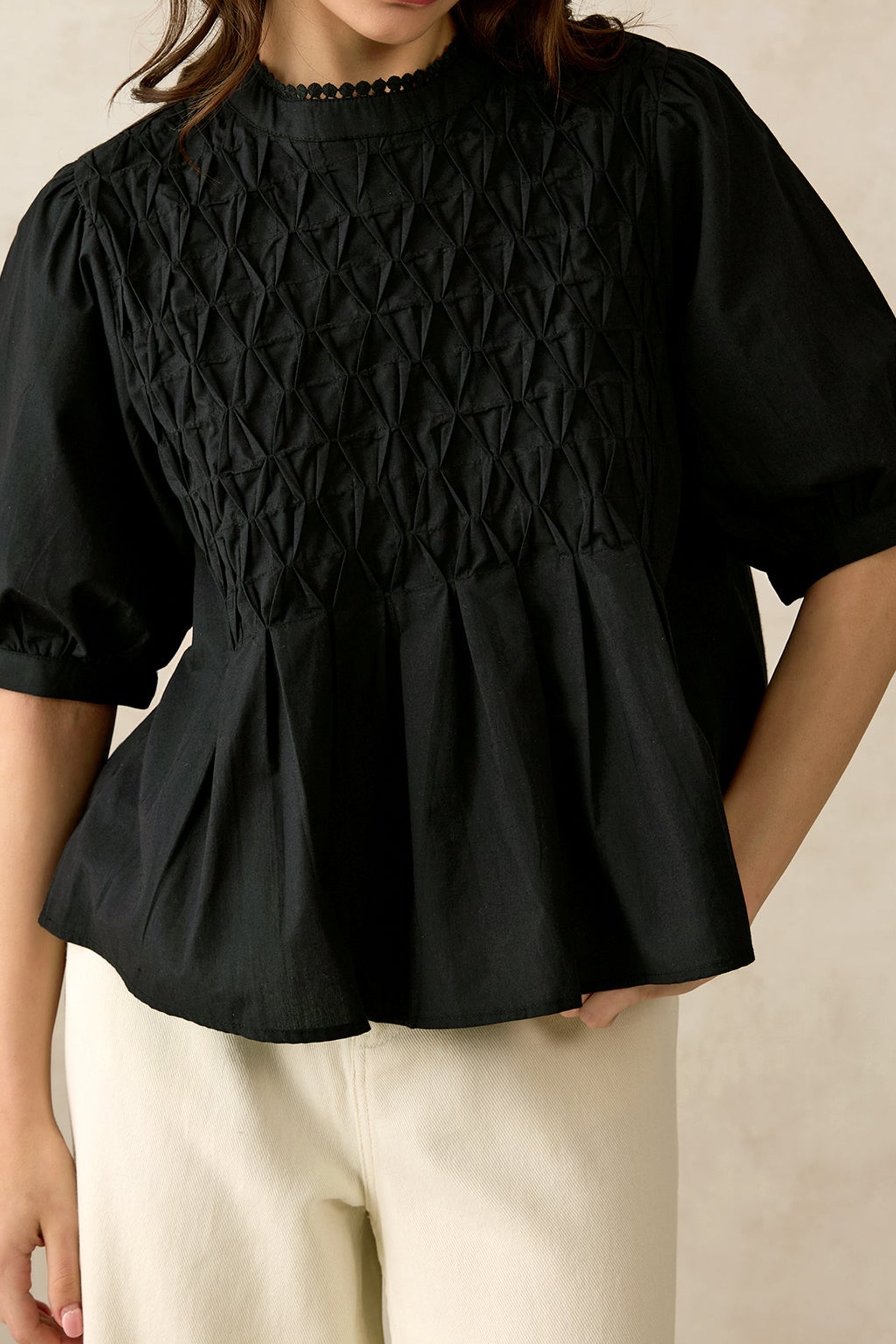 Black smocked peplum top for women, stylish and versatile fashion tops for women India