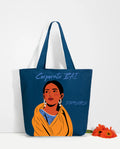 Fashion tote bag featuring a vibrant illustration of a woman in a yellow shawl by Dirtylabels