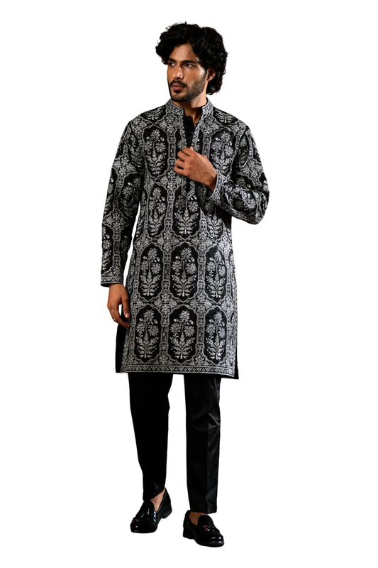 Stylish festive men's ethnic wear set featuring a black floral kurta and black trousers for special occasions