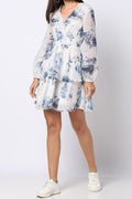 Elegant Floral Fit and Flare Dress with long sheer sleeves and a tiered skirt