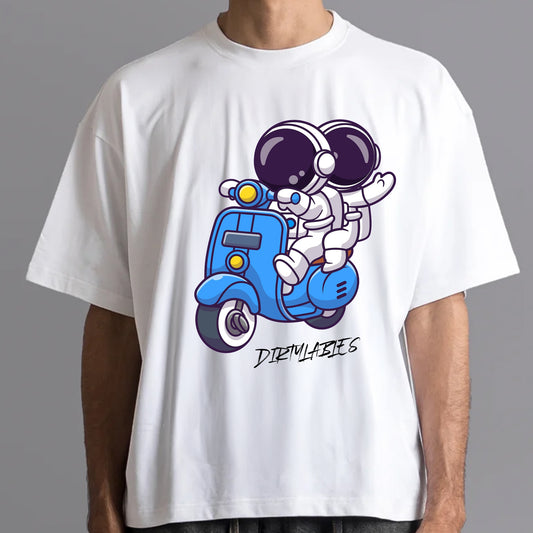 White graphic astronaut t-shirt featuring a cartoon astronaut on a blue scooter by Dirtylabels