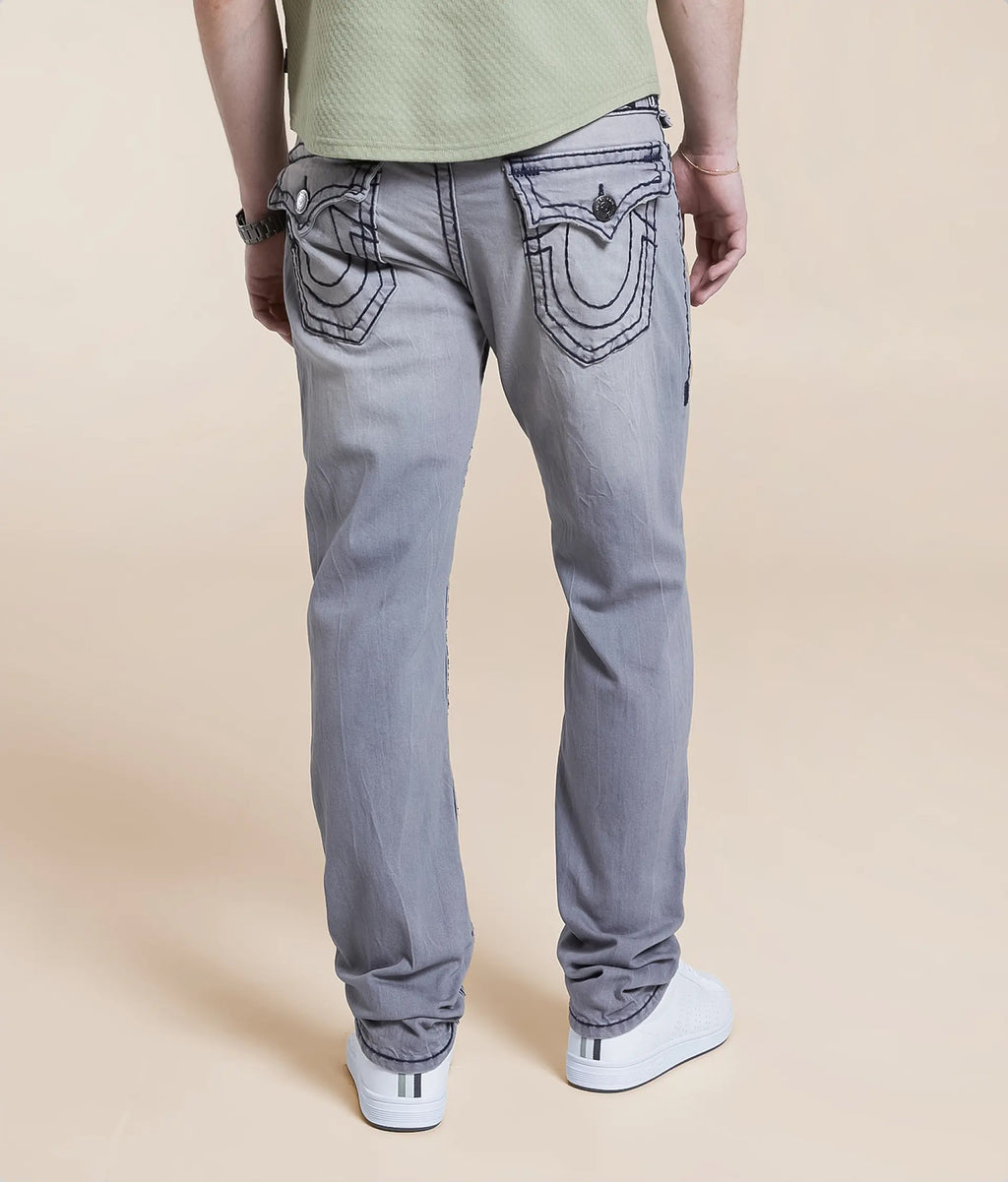 Grey Relaxed Skinny Jeans with unique back pocket detailing and comfortable fit for everyday wear