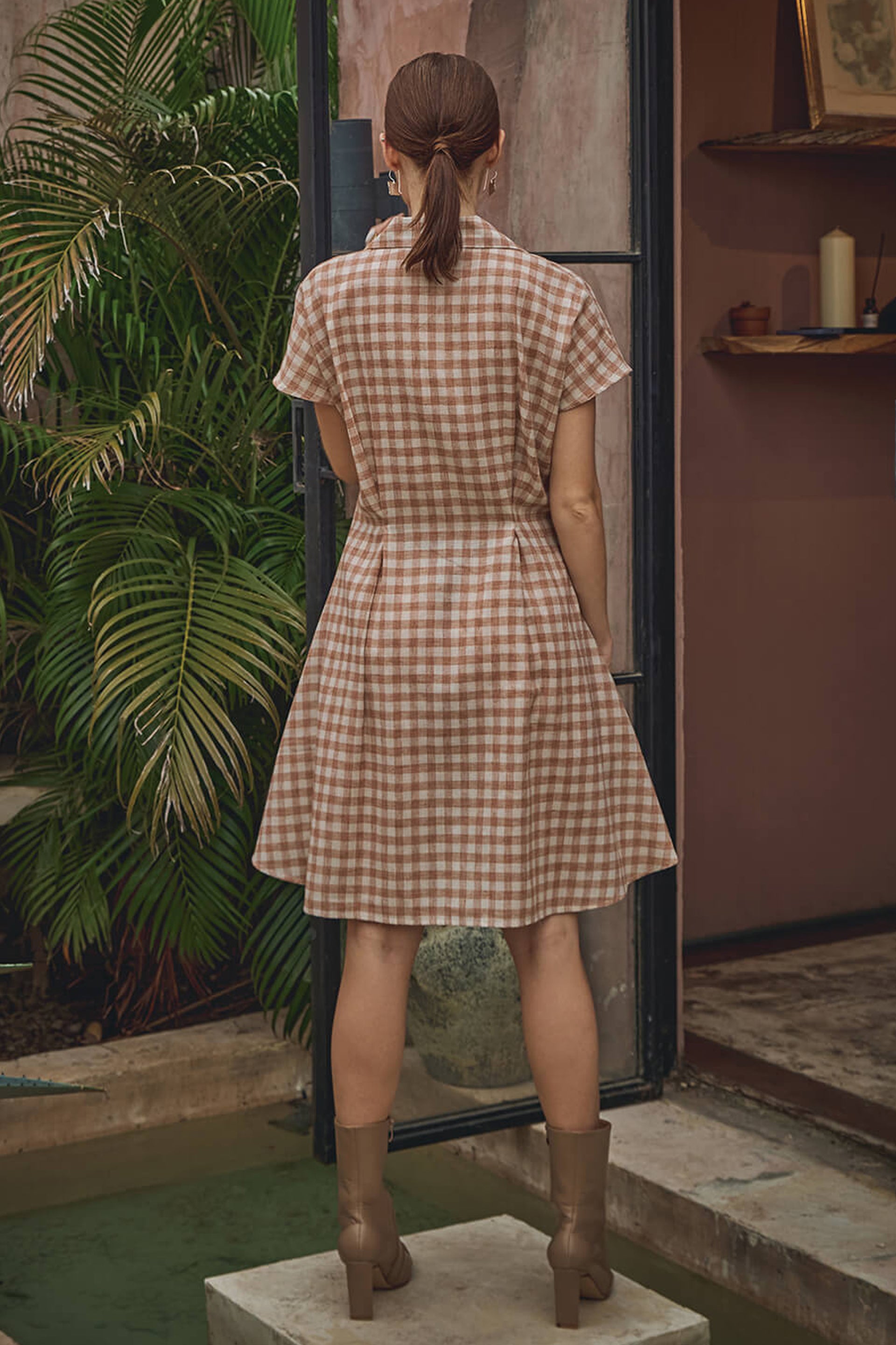 Back view of the Hampton dress for women in a brown gingham pattern, perfect for casual outings