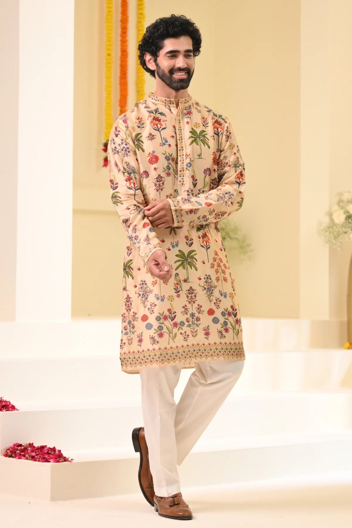 Elegant men's designer kurta pajama online featuring intricate floral patterns and a stylish collar
