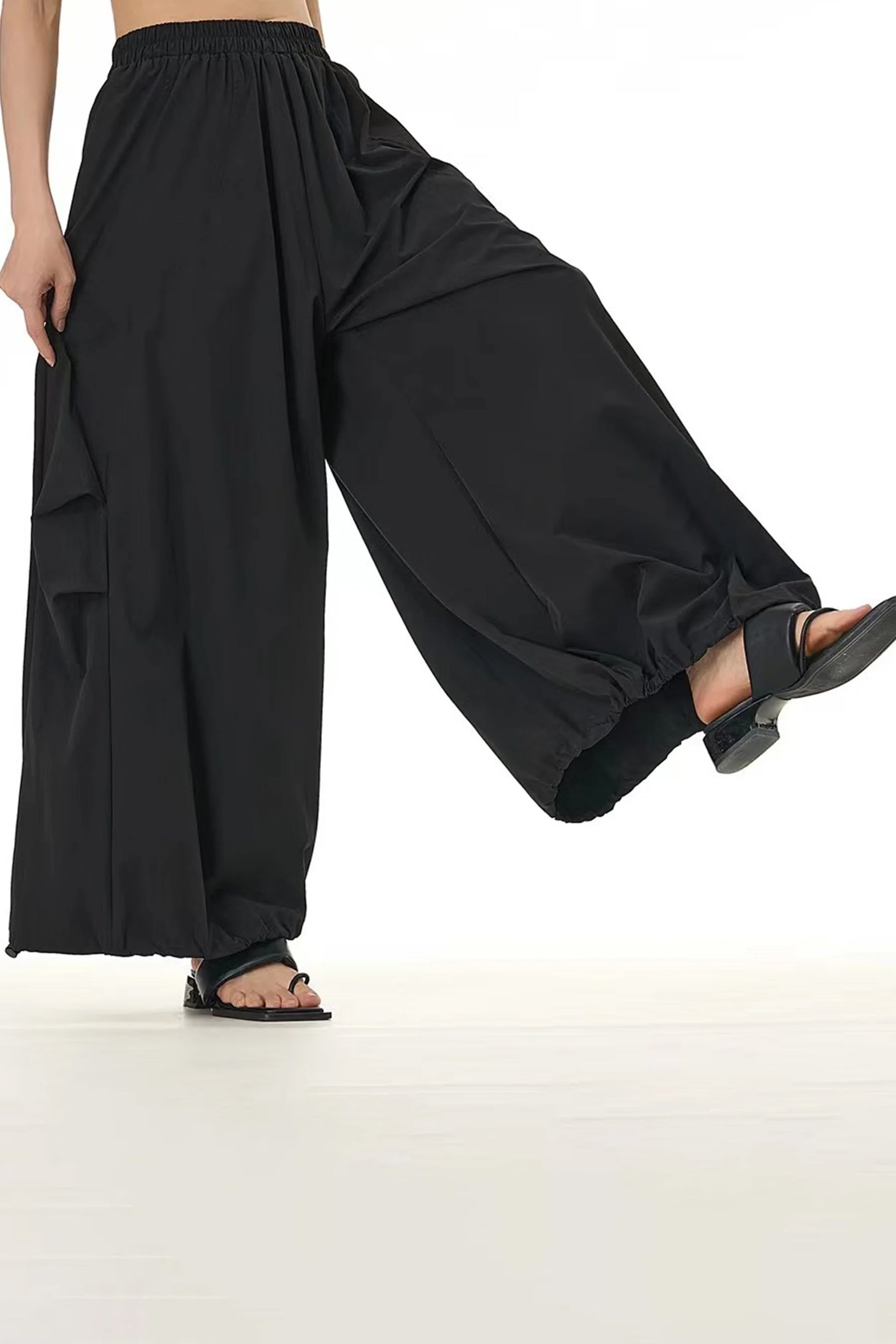 Modern black trousers for women with a relaxed fit and elastic waistband for comfort