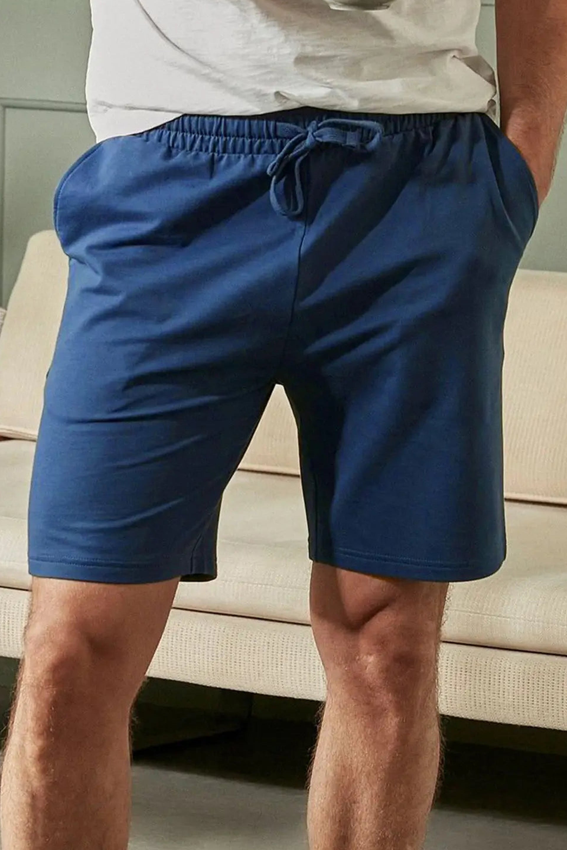 Men's Navy Blue Zip Pocket Shorts featuring an elastic waistband for comfort and style