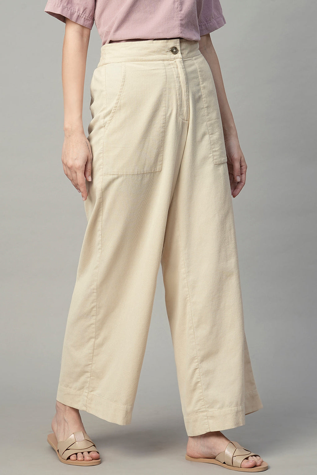 Stylish offwhite cotton culottes with side pockets and a comfortable fit, perfect for casual wear