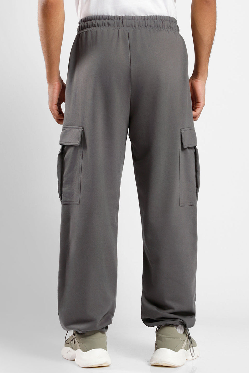 Men's oversized cargo joggers in gray with utility pockets and elastic waistband for comfort