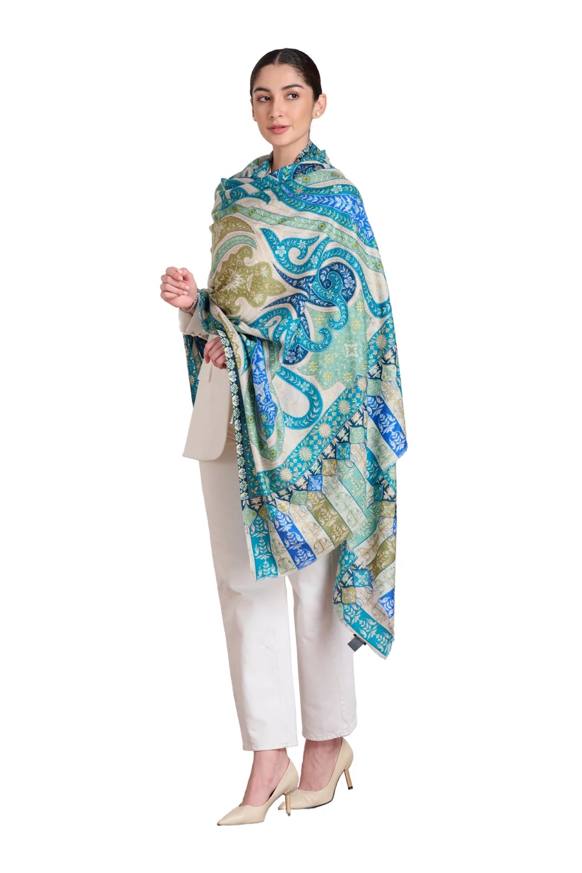 Elegant paisley embroidered kalamkari shawl in vibrant colors, worn with stylish attire for a chic look