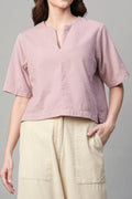 Stylish pink corduroy shirt women with short sleeves, perfect for casual outings