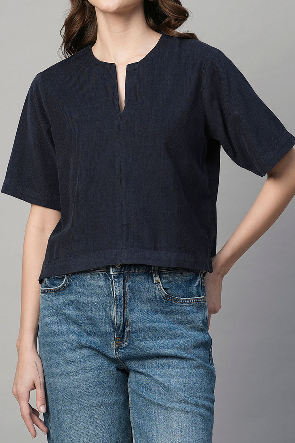 Navy regular fit women's blouse with short sleeves and a V-neckline, perfect for casual wear.