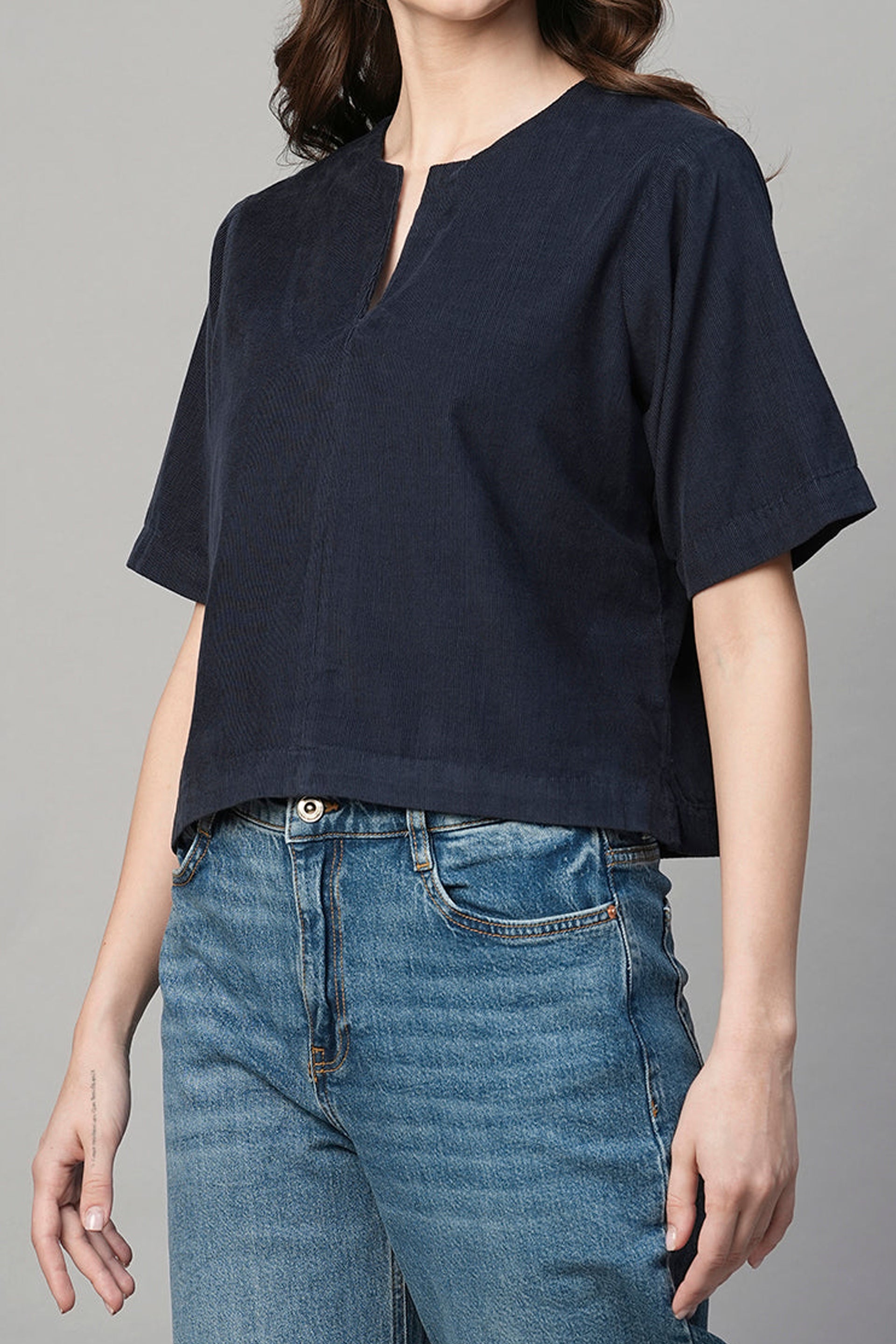 Stylish navy regular fit women's blouse with a crew neckline and short sleeves