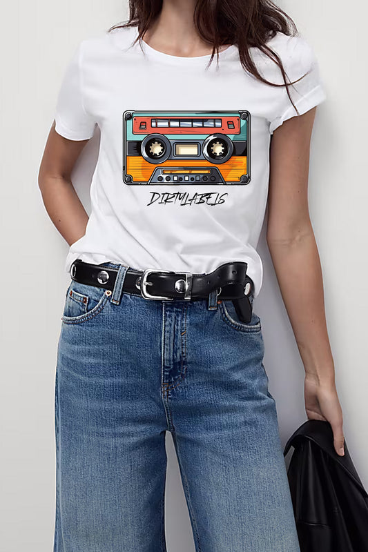 Model wearing a Dirtylabels retro fashion graphic tee featuring a colorful cassette design