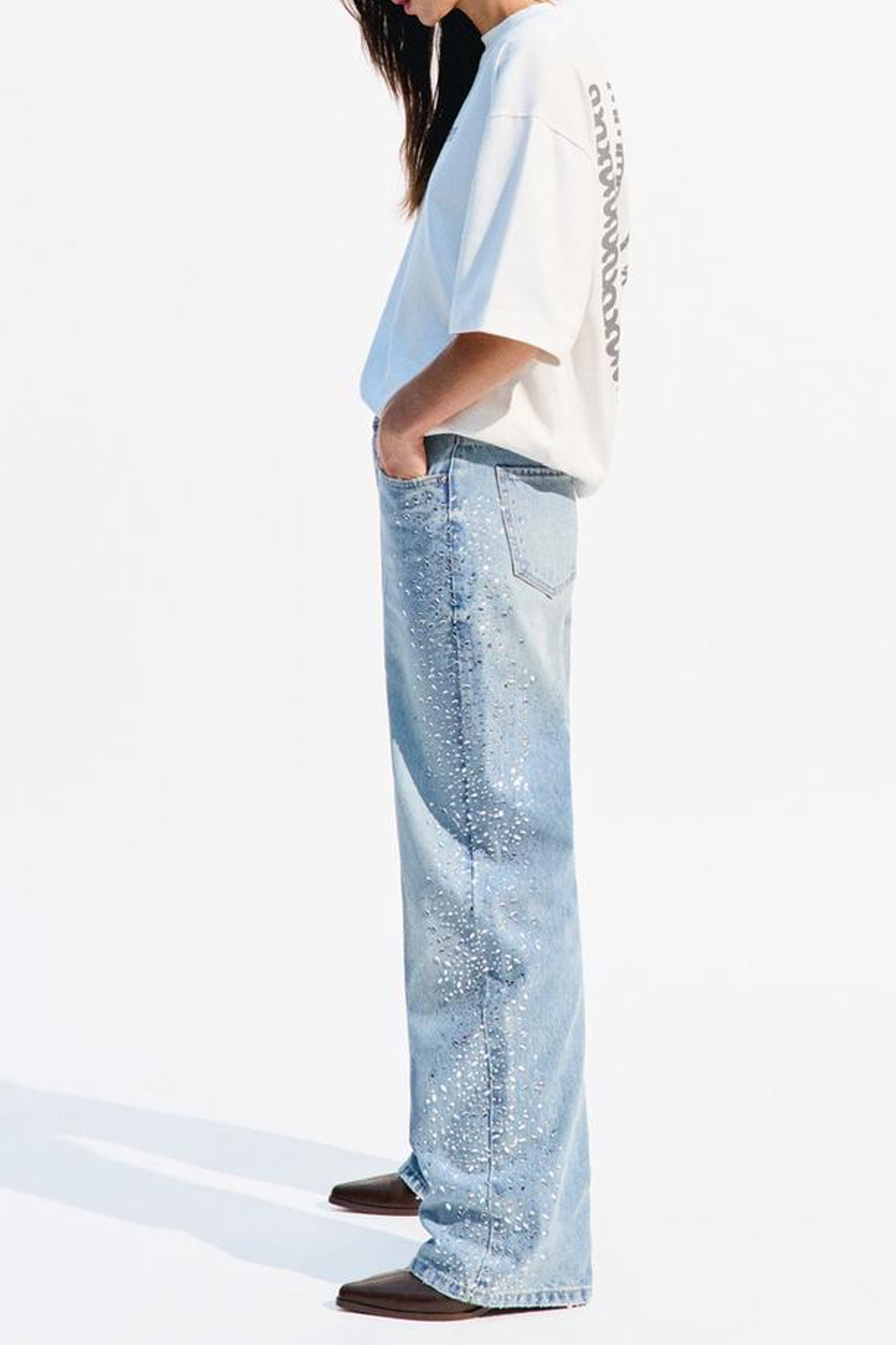 Trendy shimmery denim for women featuring a relaxed fit and stylish glitter accents