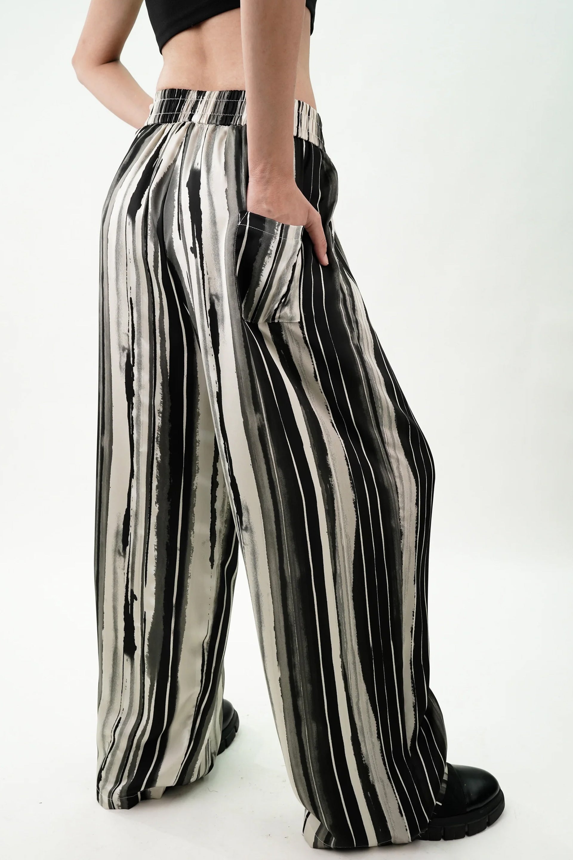 Striped wide leg pants women in black and white with a relaxed fit and side pockets