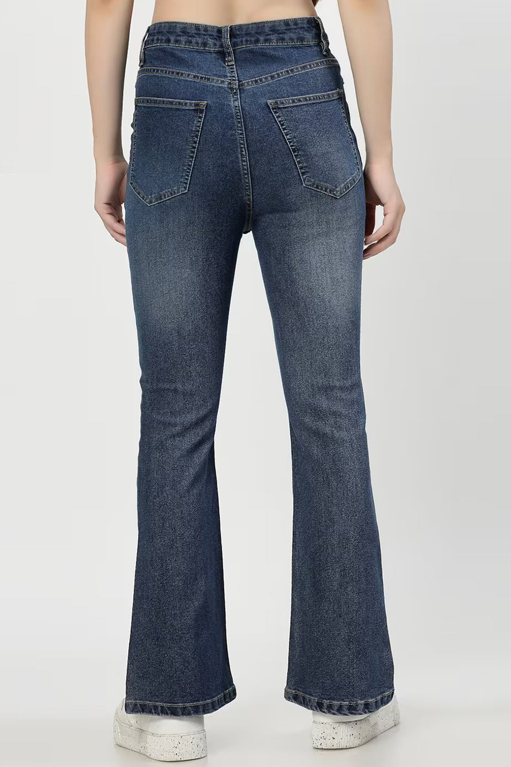 Back view of stylish bootcut denim women featuring a classic design and comfortable fit
