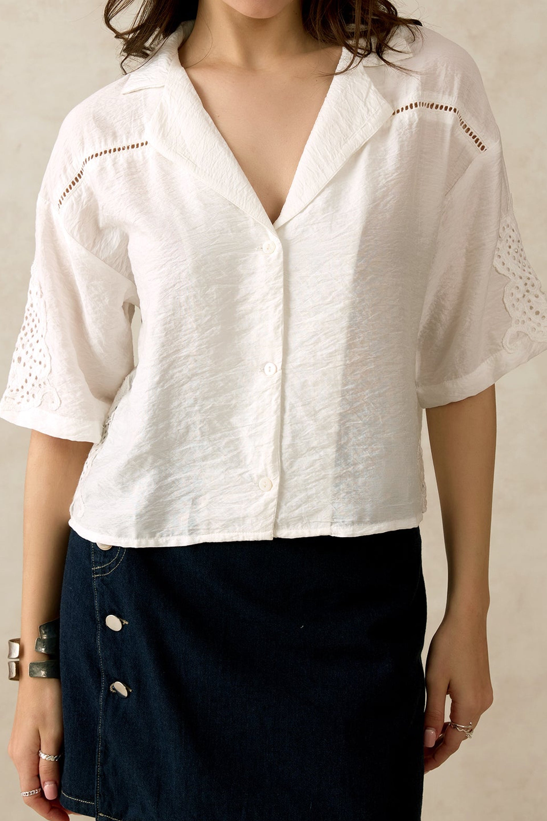 White stylish summer top from Dirtylabels with a relaxed fit and eyelet detailing for India