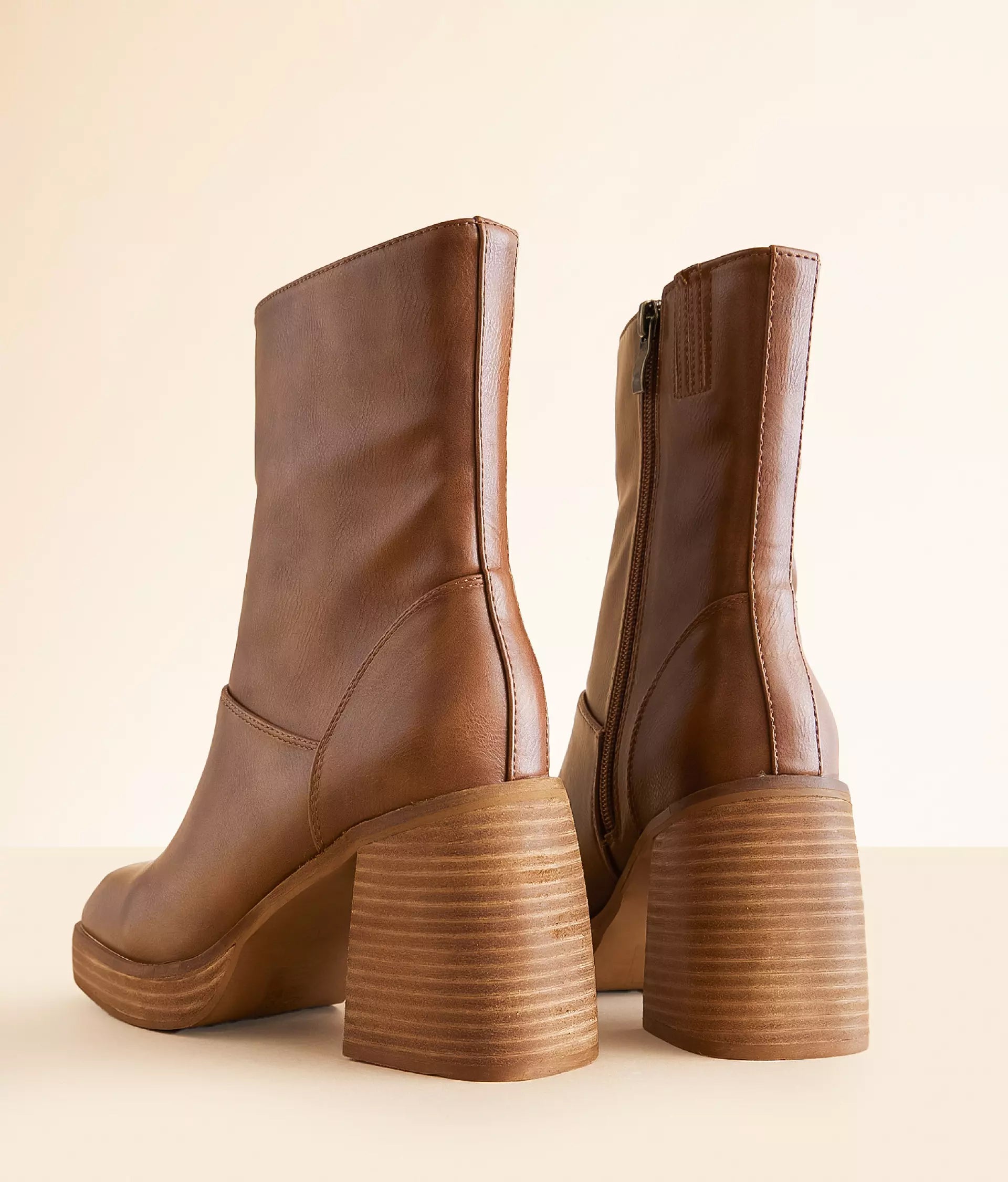 Stylish brown trendy ankle boots India with chunky heel and side zipper for a fashionable look