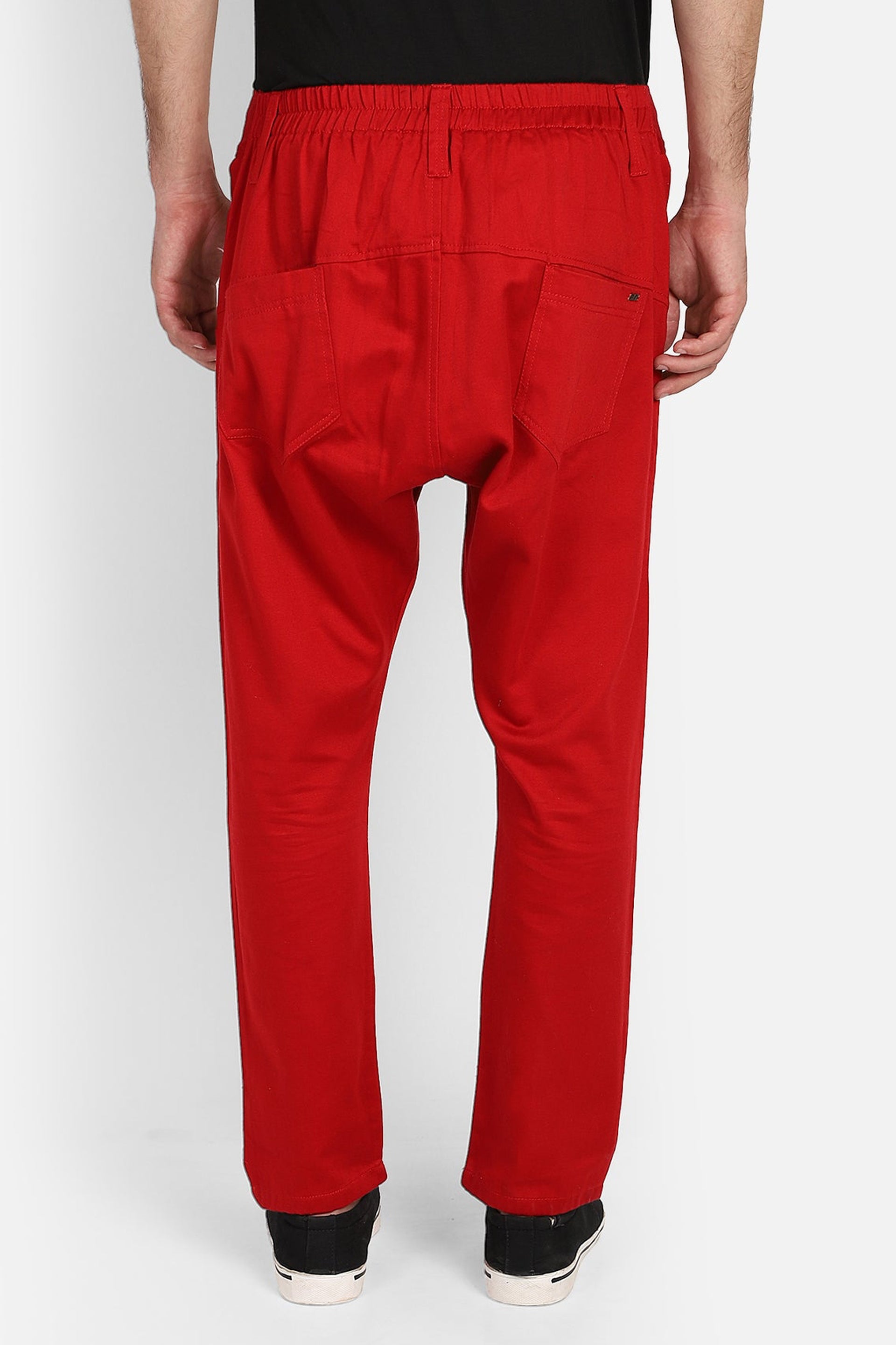 Back view of trendy red harem pants with a comfortable fit and stylish design for casual wear