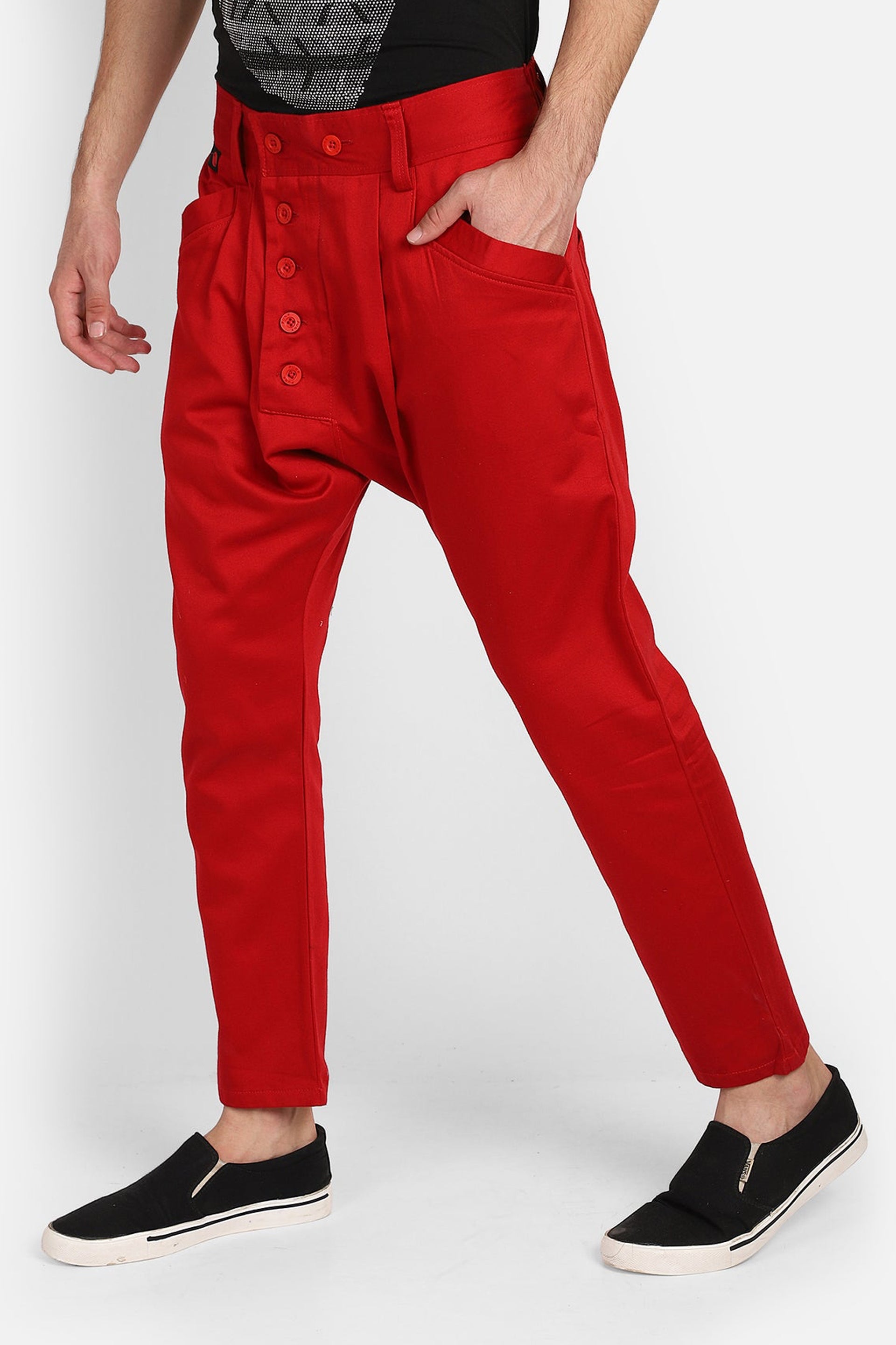 Trendy red harem pants with a stylish button design and comfortable fit for casual wear