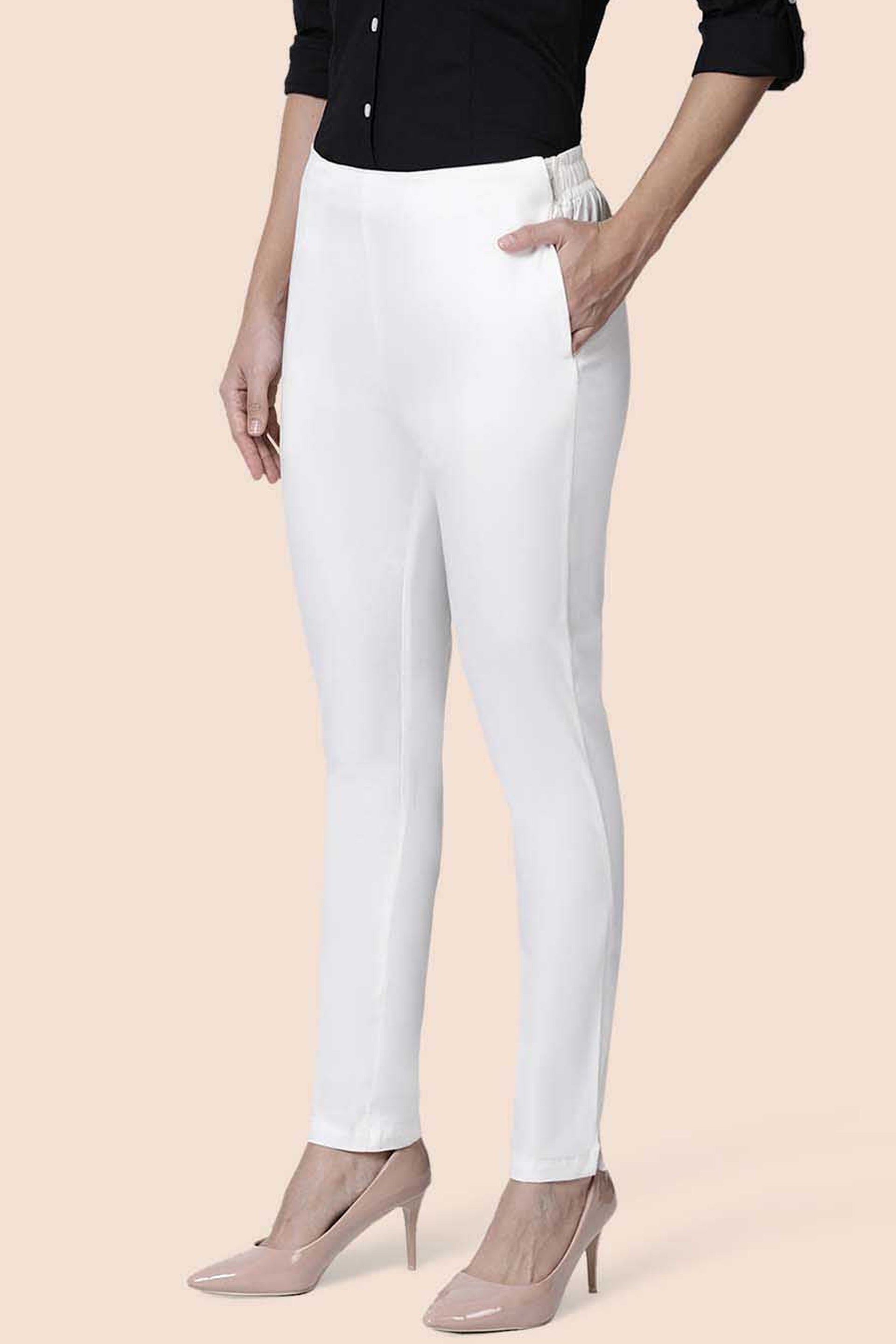 Elegant white straight pants for women, tailored fit with pockets, perfect for casual or formal wear