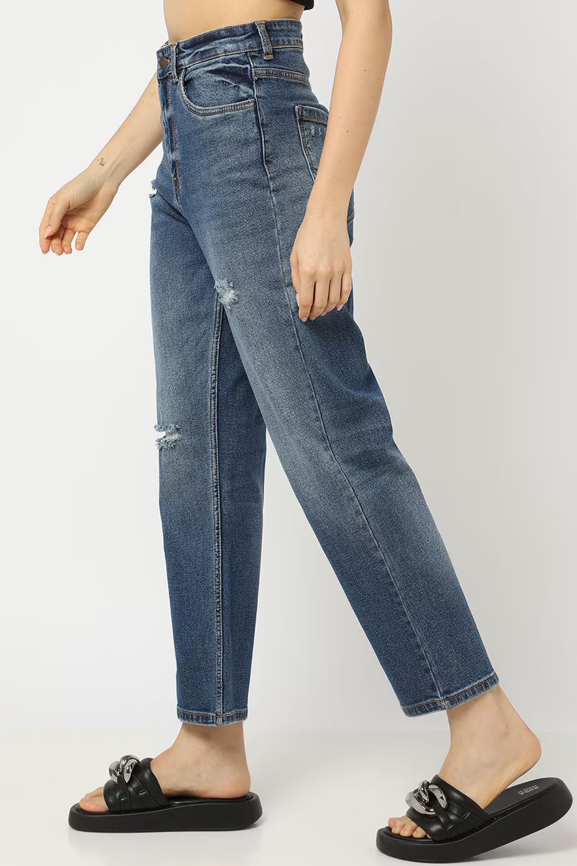 Women distressed bootcut jeans featuring a stylish and comfortable fit with a trendy washed denim look