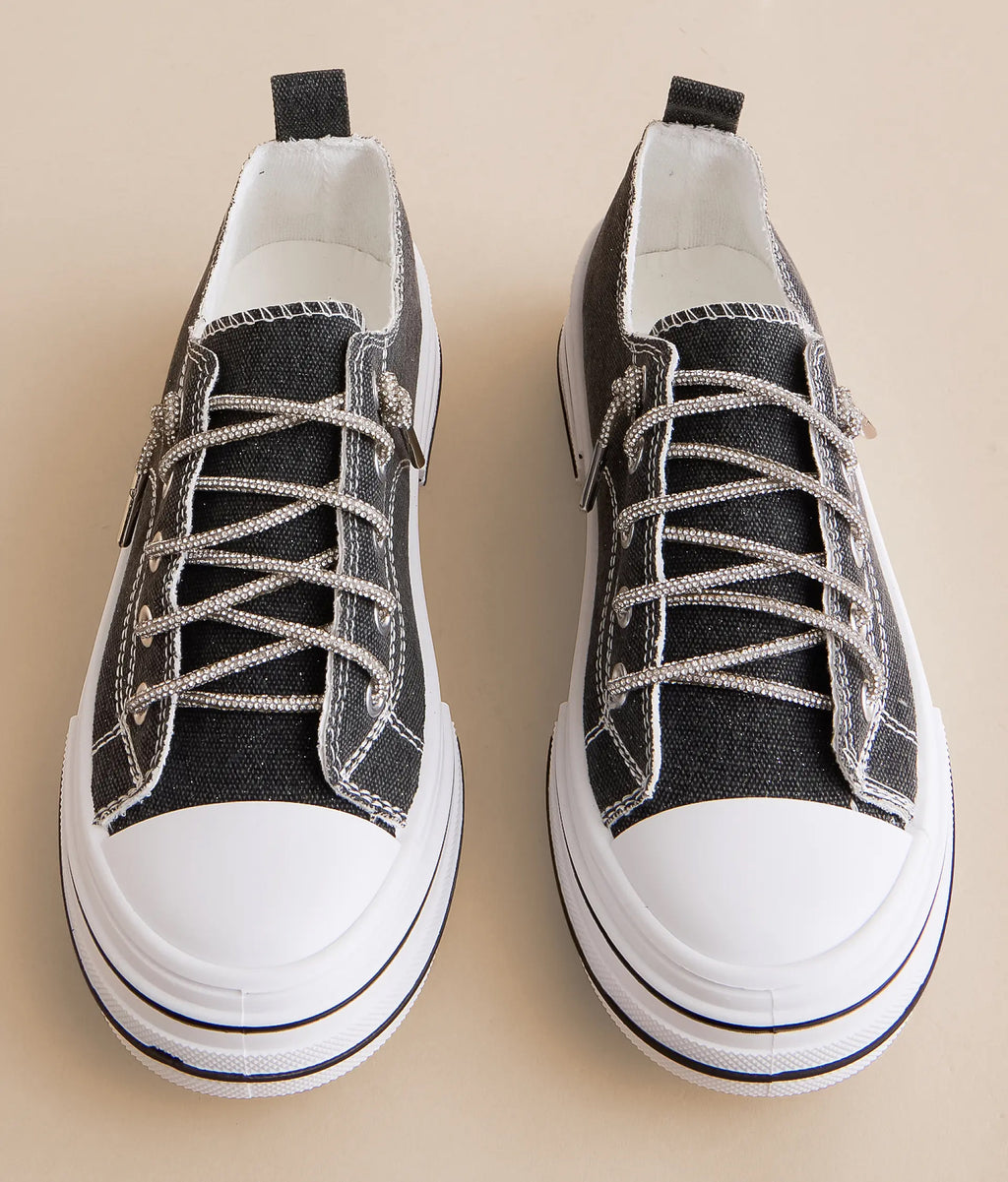 Dirtylabels women's black and white sneakers with stylish lace-up design and durable fabric