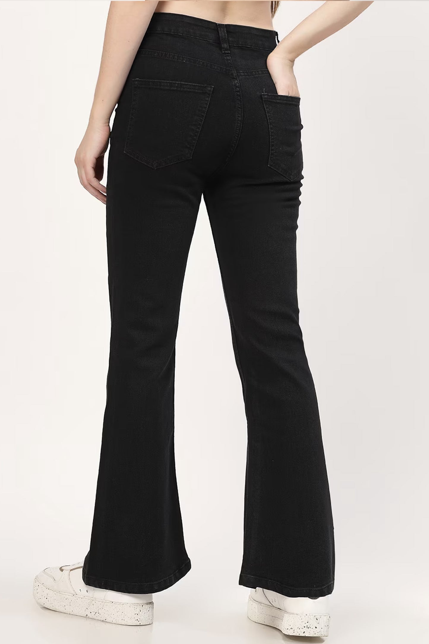Women’s black bootcut jeans featuring a fitted waist and flared legs for a stylish look