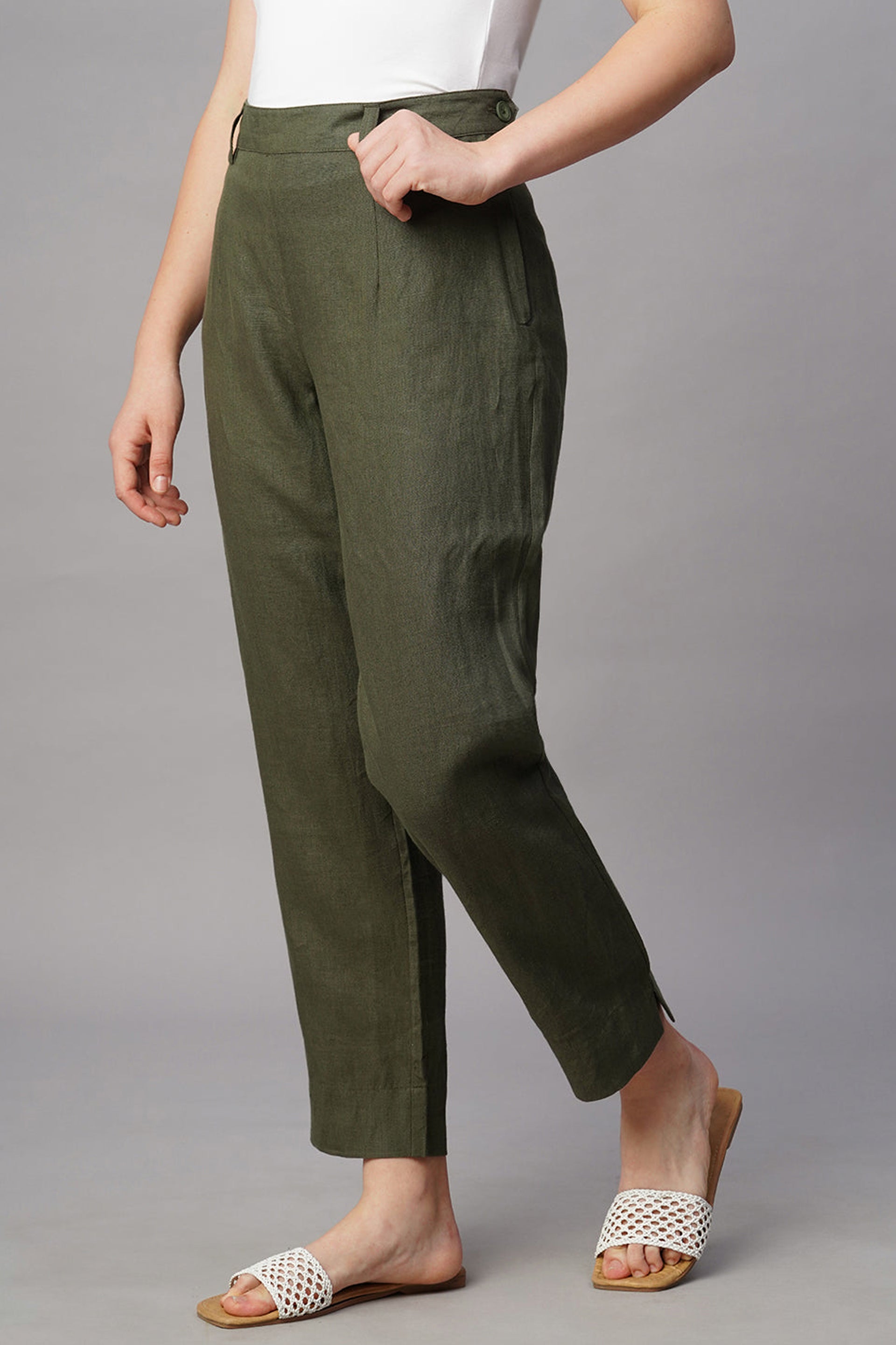 Stylish women's chic linen pants in olive green with a tailored fit and side pockets