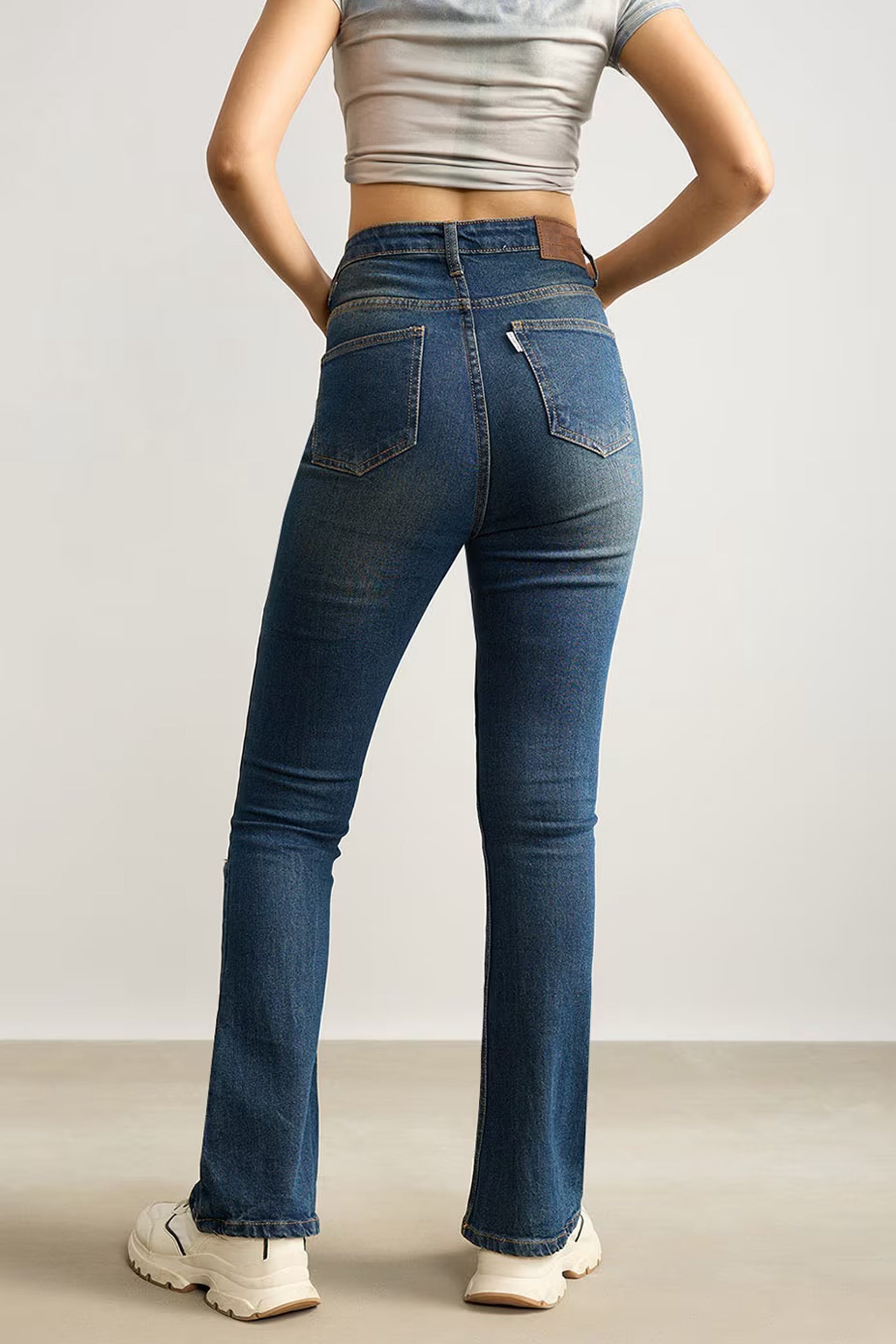 Women’s Distressed Denim Online in Dark Blue, Flared Design with a Comfortable Fit